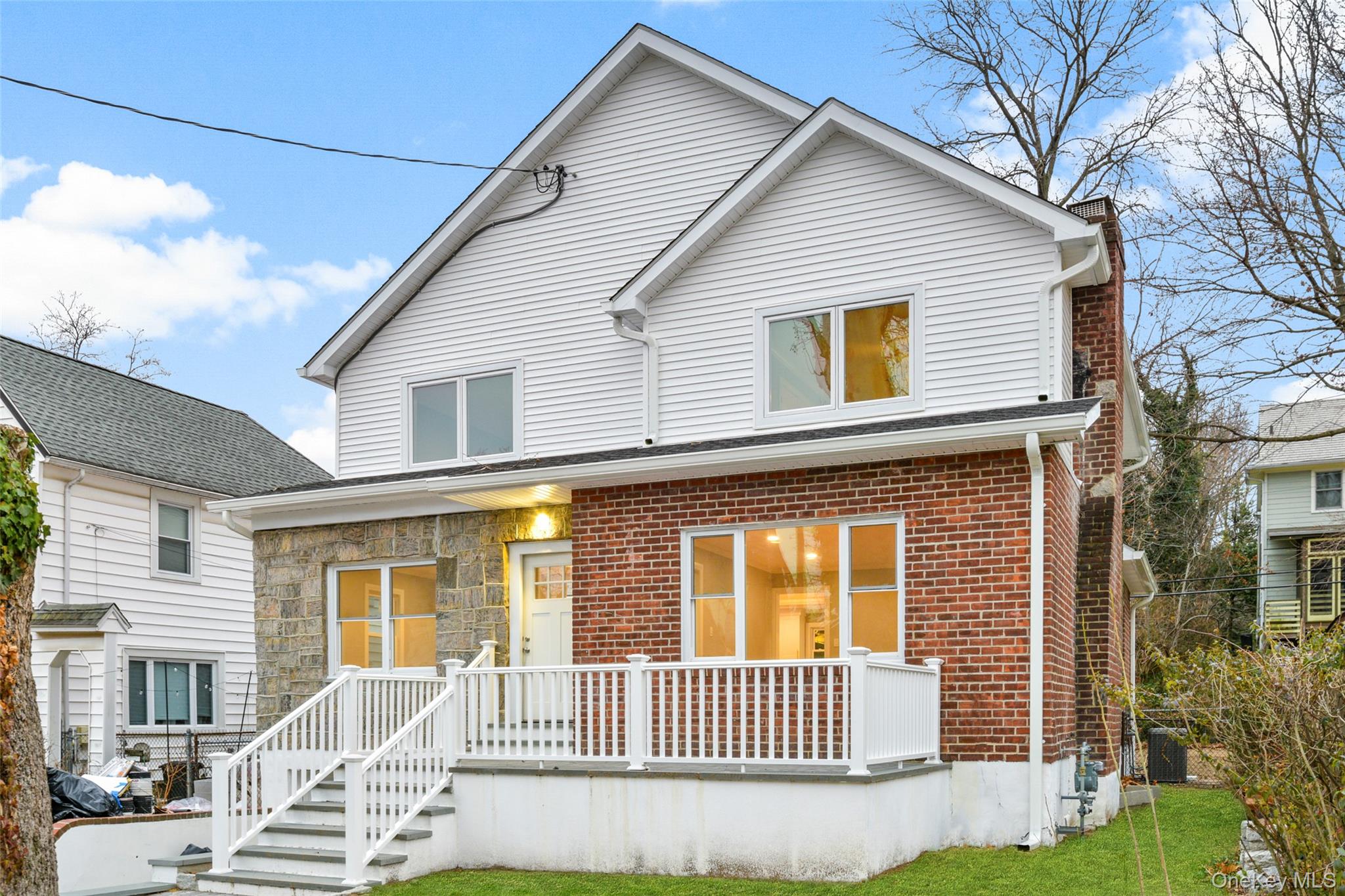 26 Ashton Road Yonkers, NY 10705 - Photo 33 of 33 a view of a house with a small yard and wooden fence
