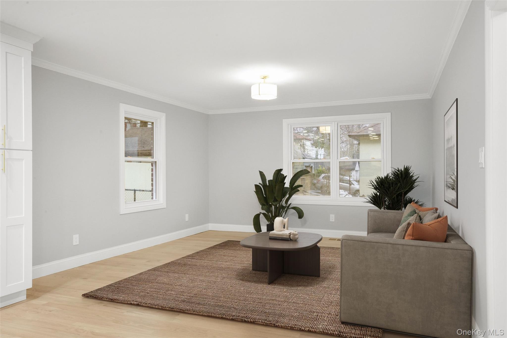 26 Ashton Road Yonkers, NY 10705 - Photo 7 of 33 a living room with furniture and a potted plant