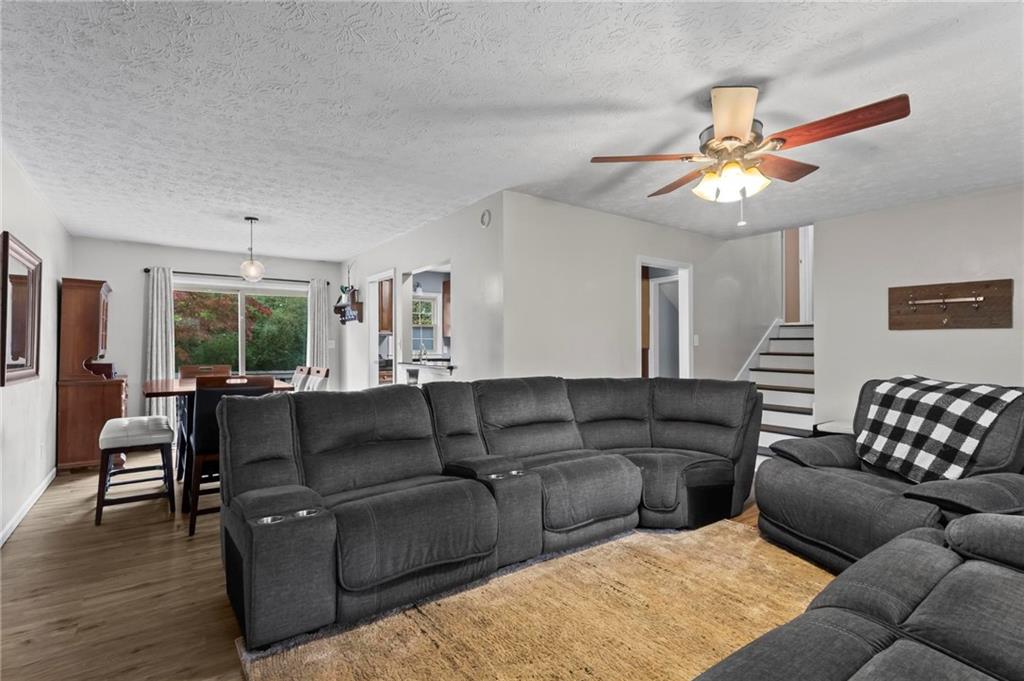 4593 Mars Court Acworth, GA 30101 - Photo 5 of 19 a living room with furniture and wooden floor