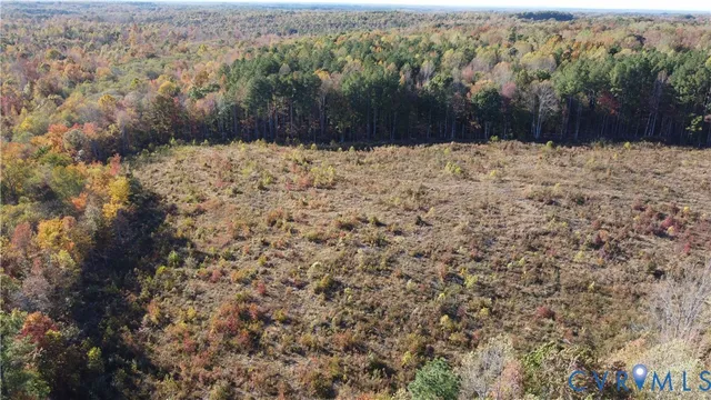 a view of a yard covered with snow