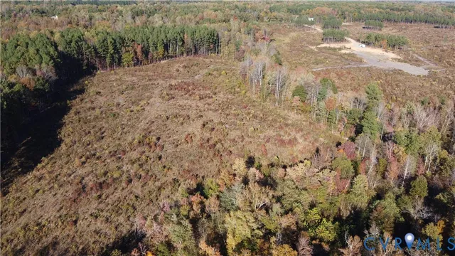 a view of a backyard of the house