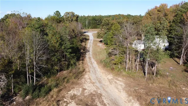 a view of a yard with trees
