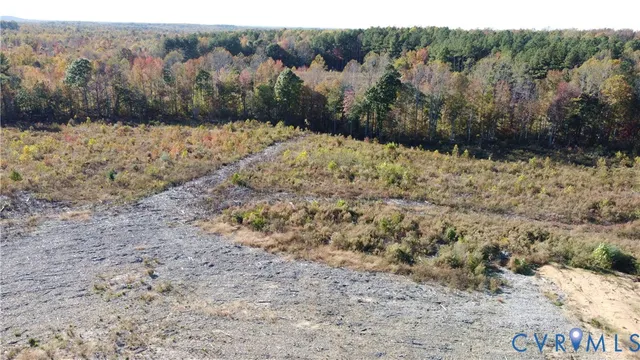 a view of a yard covered with snow