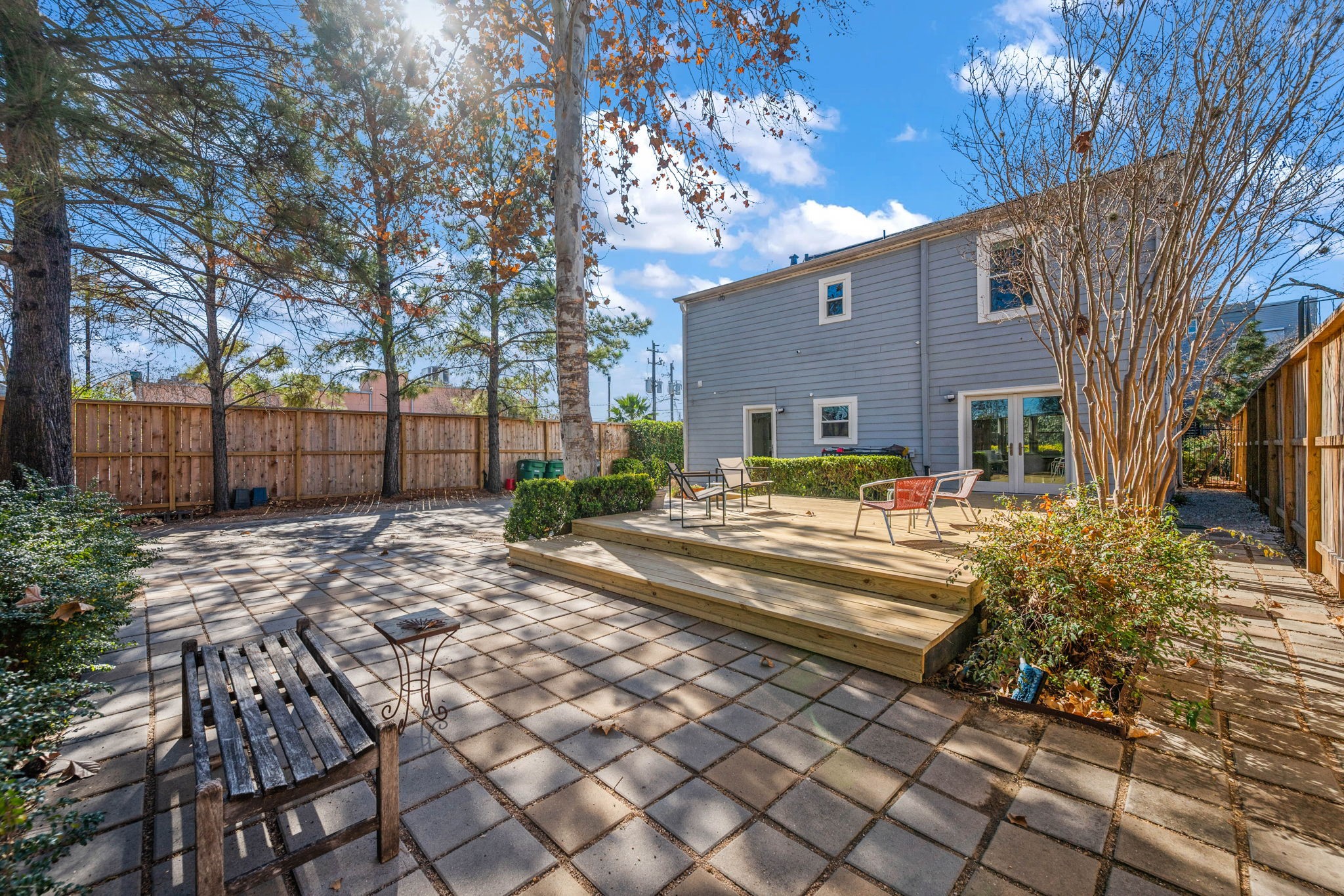 1831 Palm Street Houston, TX 77004 - Photo 21 of 27 A large lot and spacious backyard with a large paved area, perfect for entertaining or outdoor activities.