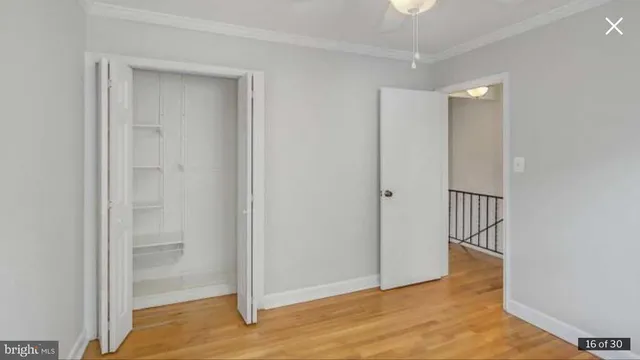 a view of entryway with wooden floor