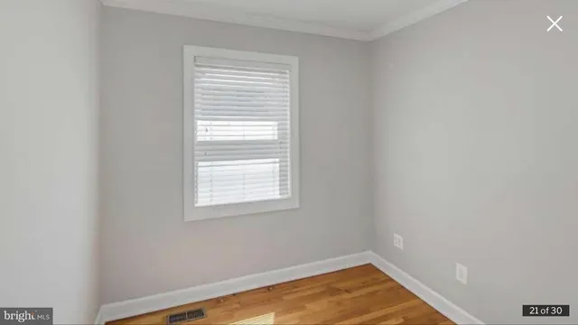 a view of a room with a window