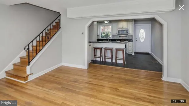 a view of livingroom with furniture and wooden floor