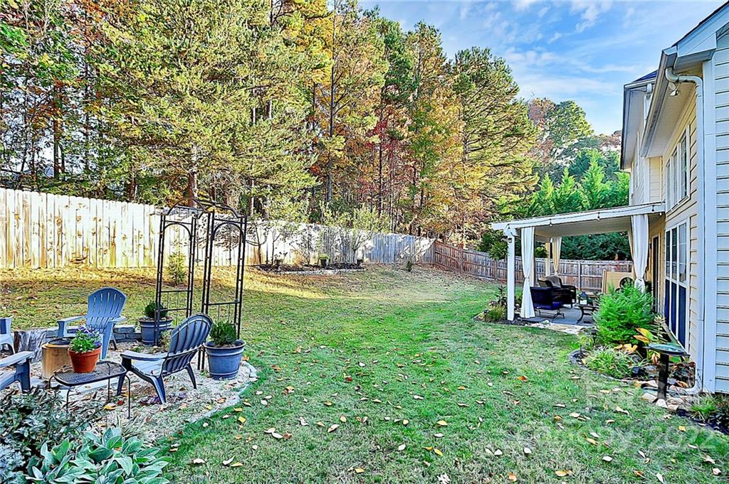 12403 Old Timber Road Charlotte, NC 28269 - Photo 25 of 33 a view of garden with patio