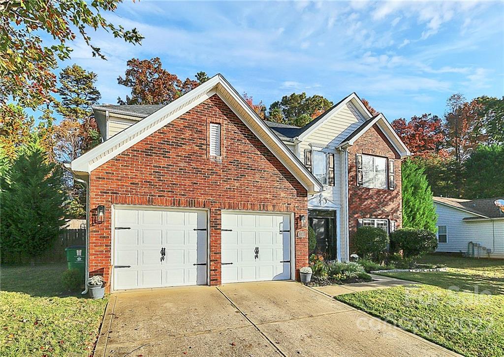 12403 Old Timber Road Charlotte, NC 28269 - Photo 31 of 33 a view of a house with a yard