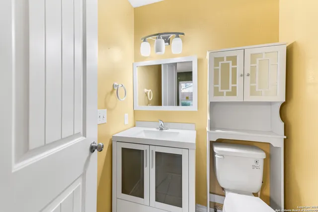 a bathroom with a sink and a toilet