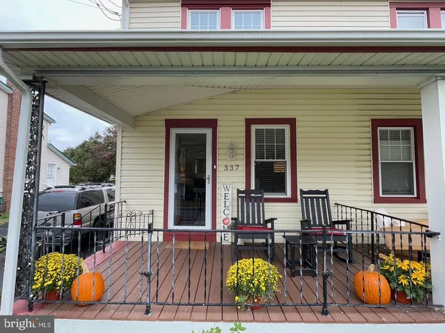 front view of house with outdoor seating space