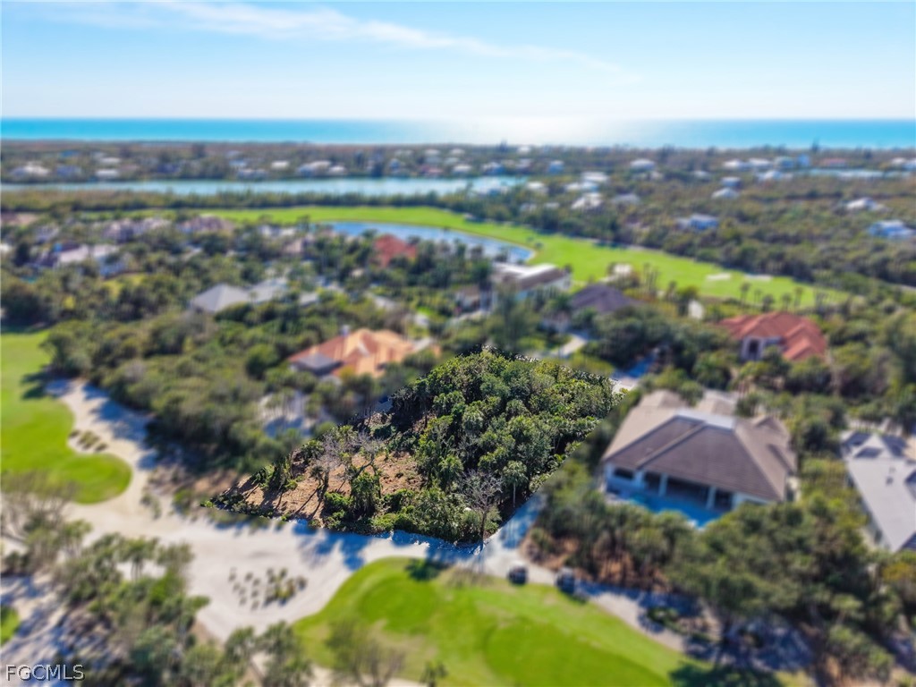 2486 Wulfert Road Sanibel, FL 33957 - Photo 11 of 26 an aerial view of residential building and lake