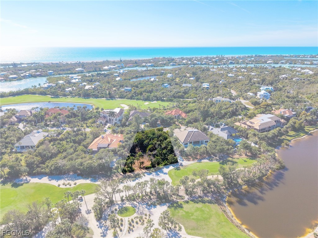 2486 Wulfert Road Sanibel, FL 33957 - Photo 16 of 26 a view of a lake with a city