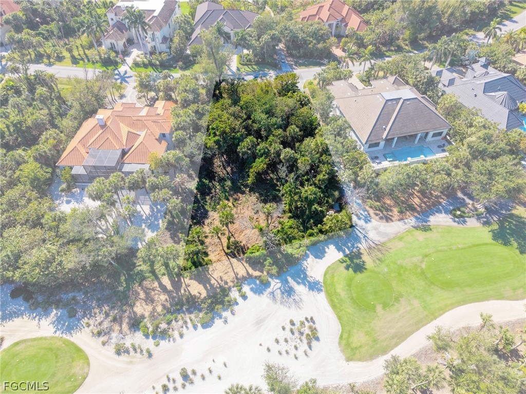 2486 Wulfert Road Sanibel, FL 33957 - Photo 20 of 26 a close up of a flower in a garden