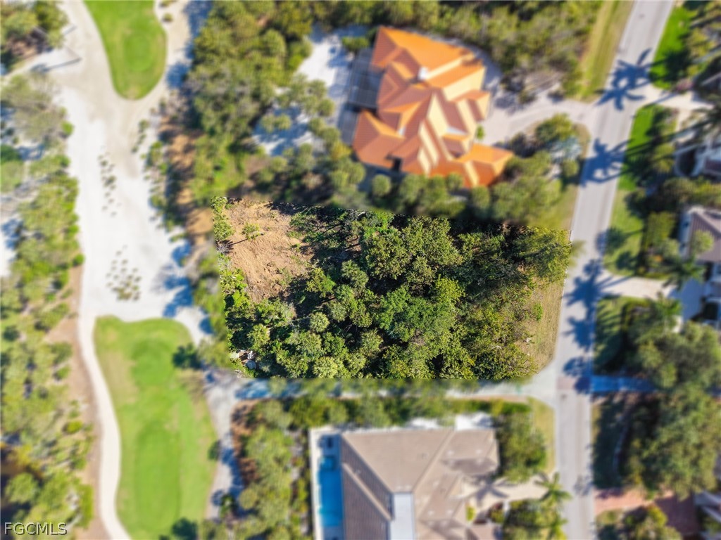 2486 Wulfert Road Sanibel, FL 33957 - Photo 21 of 26 a view of a tree with a yard