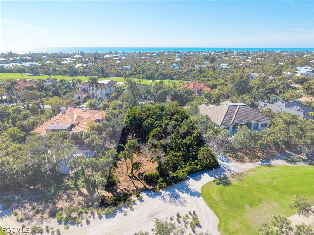 2486 Wulfert Road Sanibel, FL 33957 - Photo 5 of 26 an aerial view of residential building and lake