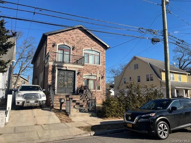 a car parked in front of a house