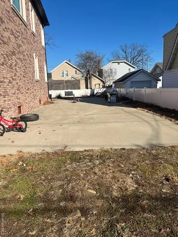a view of a street with cars