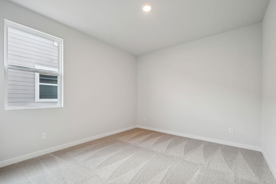 13419 Derby Ride Drive Buda, TX 78610 - Photo 16 of 29 an empty room with a window
