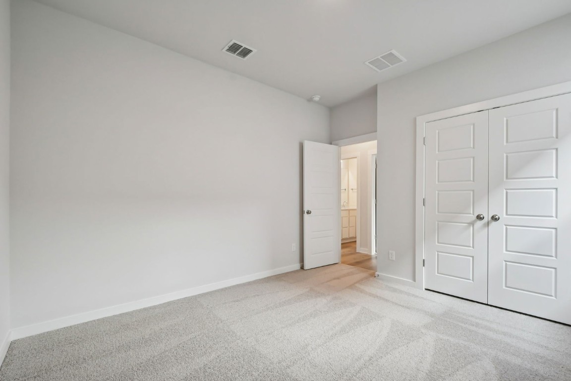 13419 Derby Ride Drive Buda, TX 78610 - Photo 17 of 29 a view of an empty room