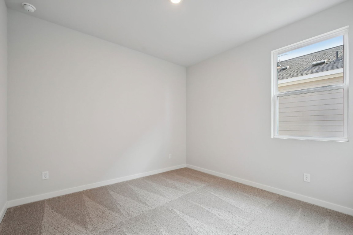 13419 Derby Ride Drive Buda, TX 78610 - Photo 19 of 29 a view of an empty room