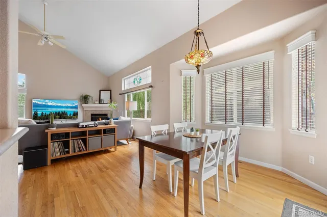 a living room with furniture fireplace and a flat screen tv