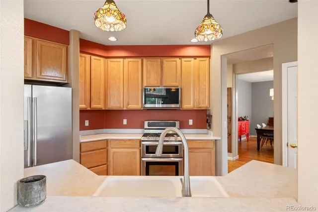 a kitchen with a sink and a window