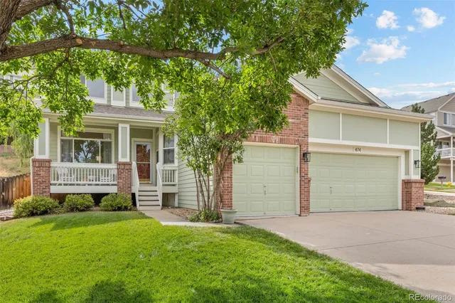 front view of a house and a yard