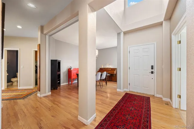 a view of a room with furniture window and wooden floor