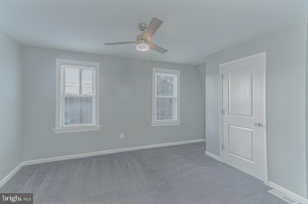 215 North Fairview Street Riverside, NJ 08075 - Photo 17 of 25 an empty room with windows and closet