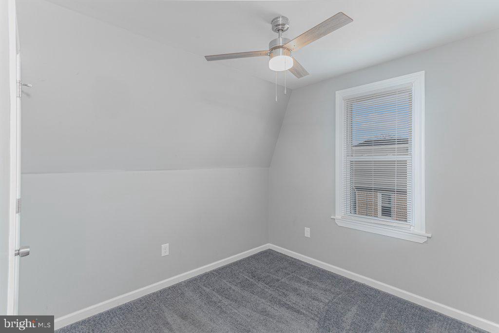 215 North Fairview Street Riverside, NJ 08075 - Photo 21 of 25 an empty room with a window and ceiling fan
