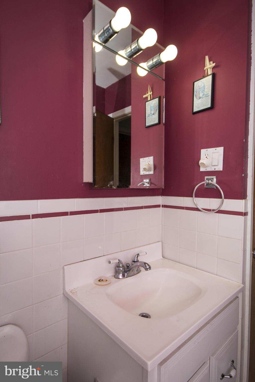 6718 Glenkirk Road Baltimore, MD 21239 - Photo 20 of 30 Full Bath on Main Level