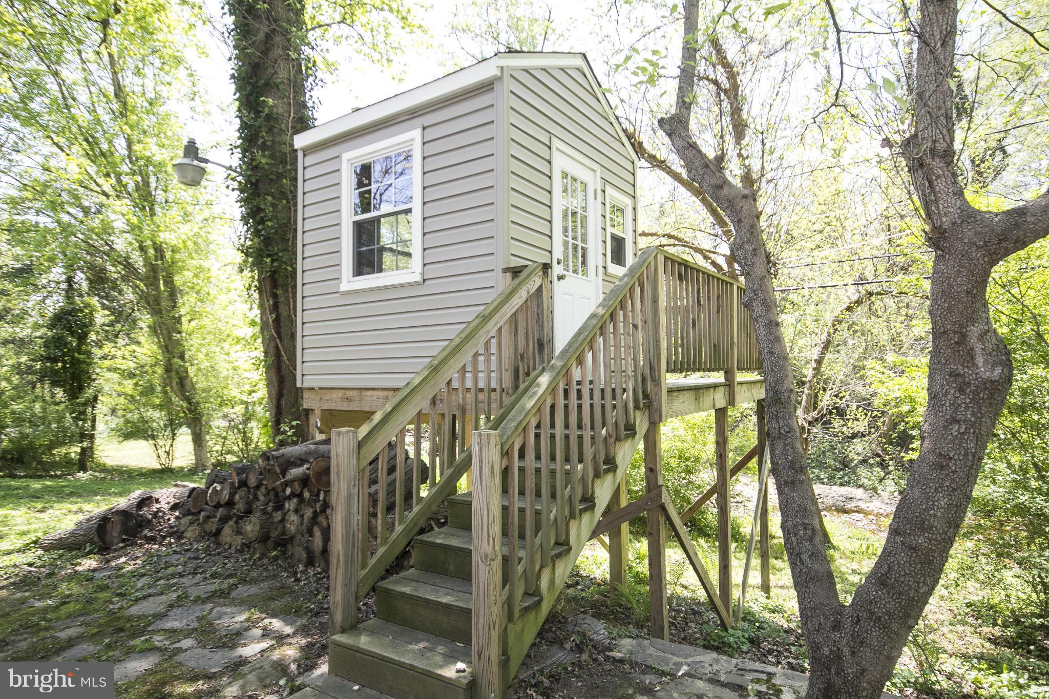 6718 Glenkirk Road Baltimore, MD 21239 - Photo 29 of 30 Storage/Play House w/ Replacement Windows