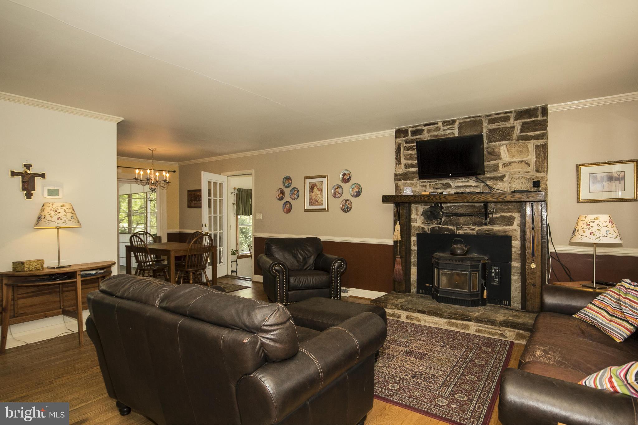 6718 Glenkirk Road Baltimore, MD 21239 - Photo 4 of 30 Living Room with Hardwoods & Pellet FP!