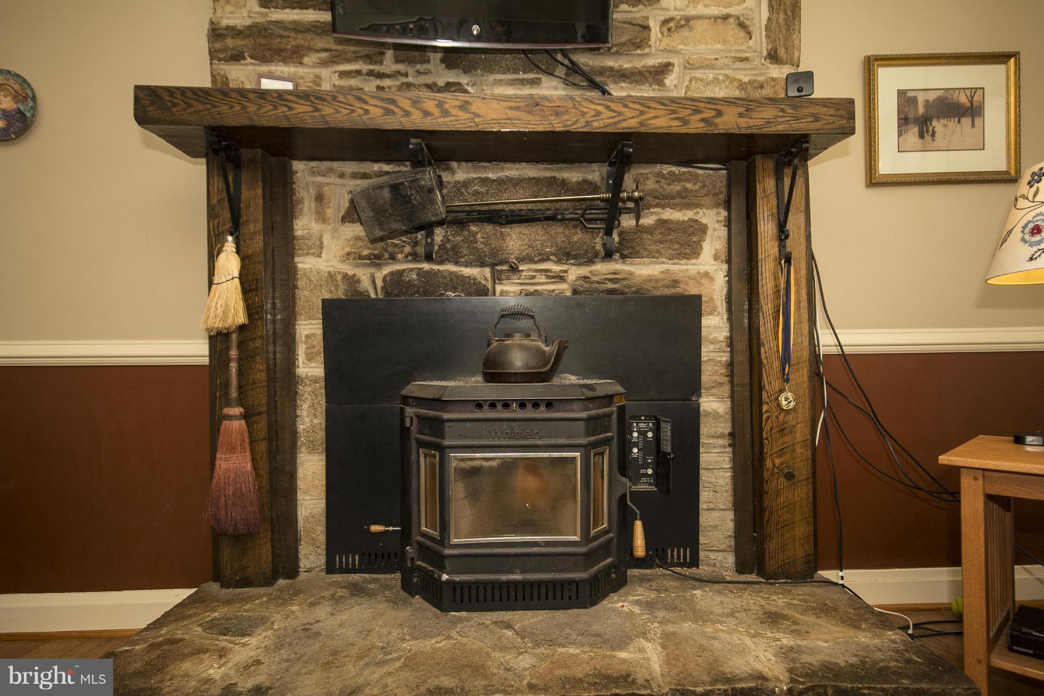 6718 Glenkirk Road Baltimore, MD 21239 - Photo 5 of 30 Pellet Wood Fireplace. Energy Efficient Heat!