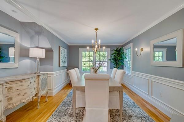 24 Birch Road Wellesley, MA 02482 - Photo 16 of 39 a living room with furniture and a chandelier