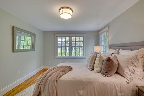 24 Birch Road Wellesley, MA 02482 - Photo 28 of 39 a bedroom with a bed and a window