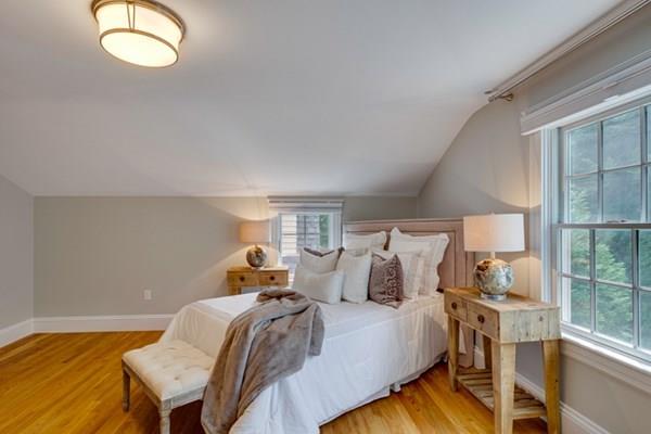 24 Birch Road Wellesley, MA 02482 - Photo 30 of 39 a bedroom with a bed and window