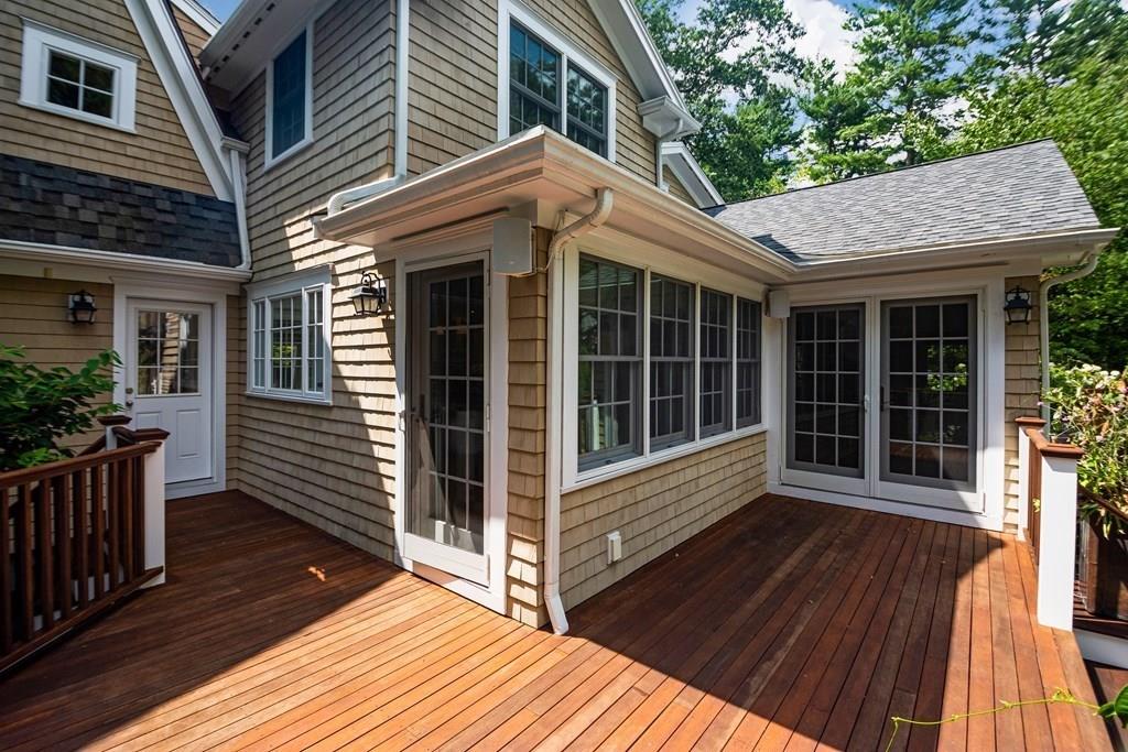 24 Birch Road Wellesley, MA 02482 - Photo 36 of 39 a view of house with deck and wooden floor