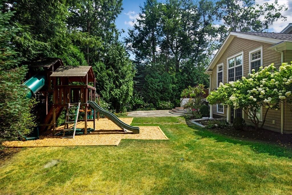 24 Birch Road Wellesley, MA 02482 - Photo 38 of 39 a view of a house with a swimming pool