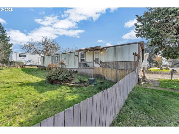a view of a backyard with a garden