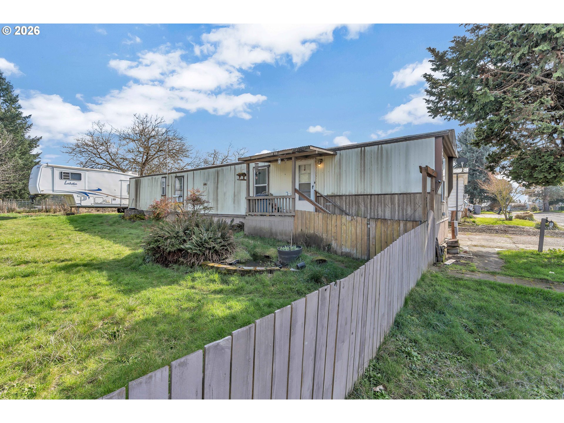 a view of a backyard with a garden