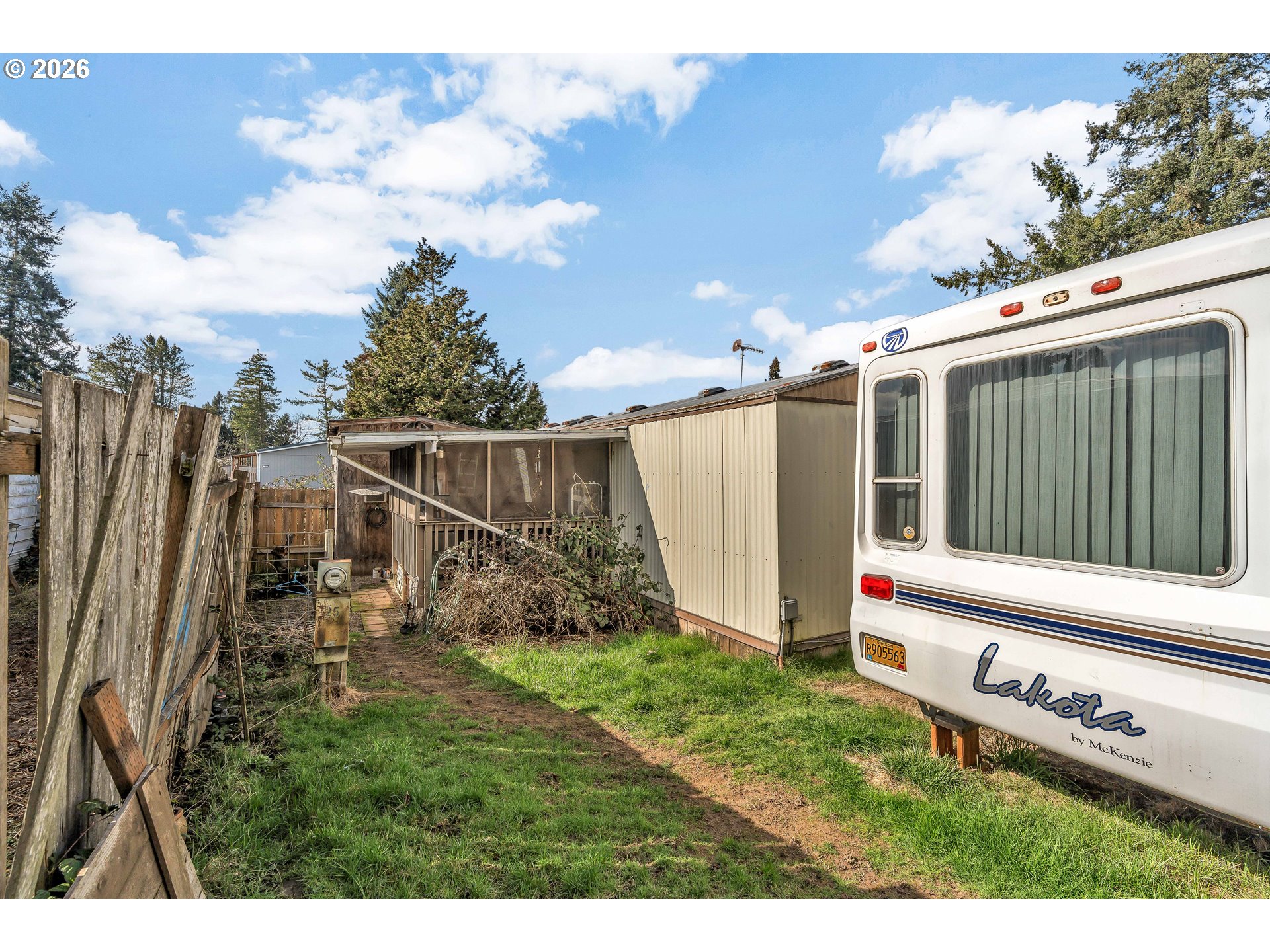 10038 South New Era Road, Unit 25 Canby, OR 97013 - Photo 29 of 39 a view of backyard with tub