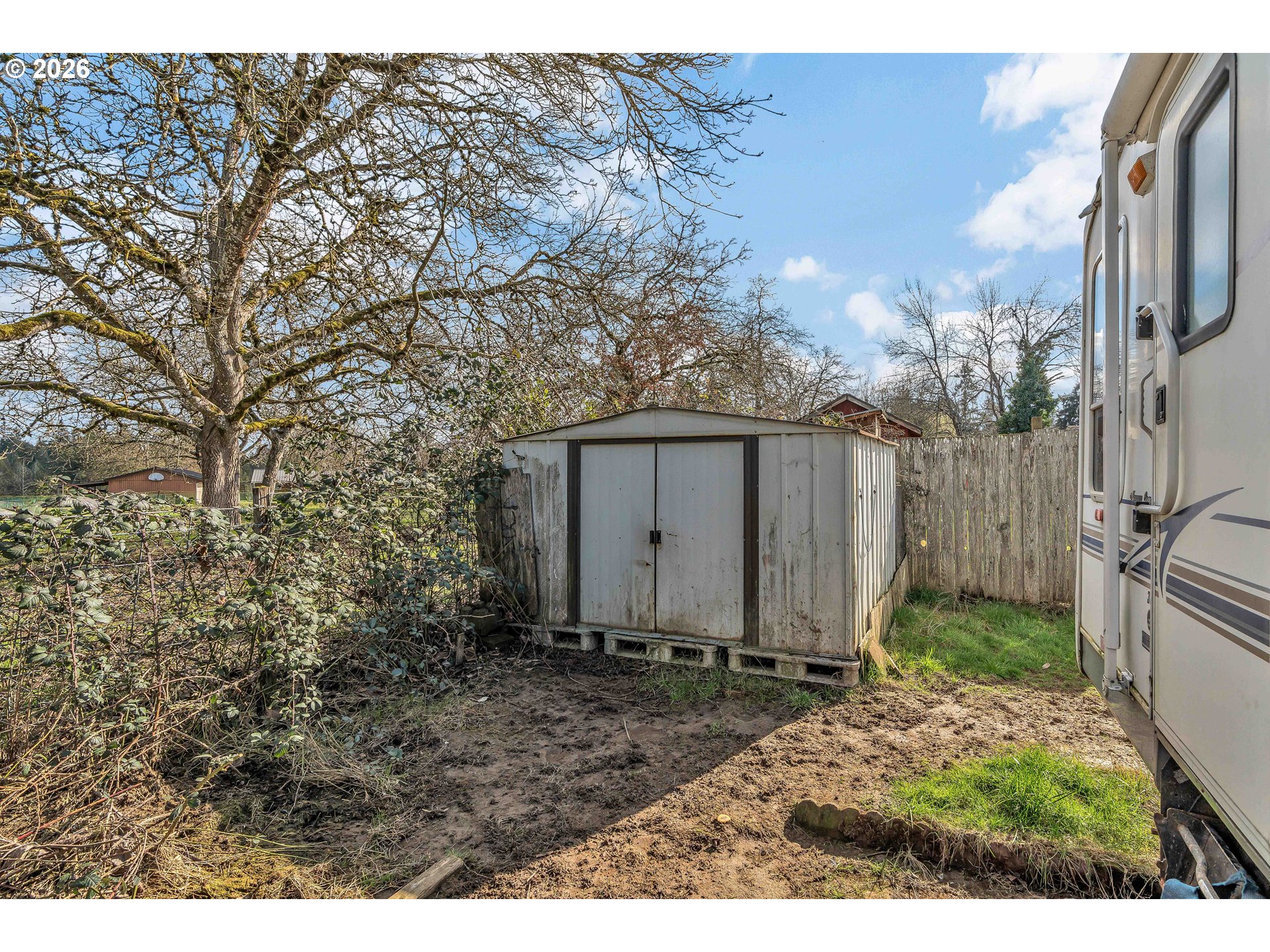 10038 South New Era Road, Unit 25 Canby, OR 97013 - Photo 30 of 39 a view of a back yard