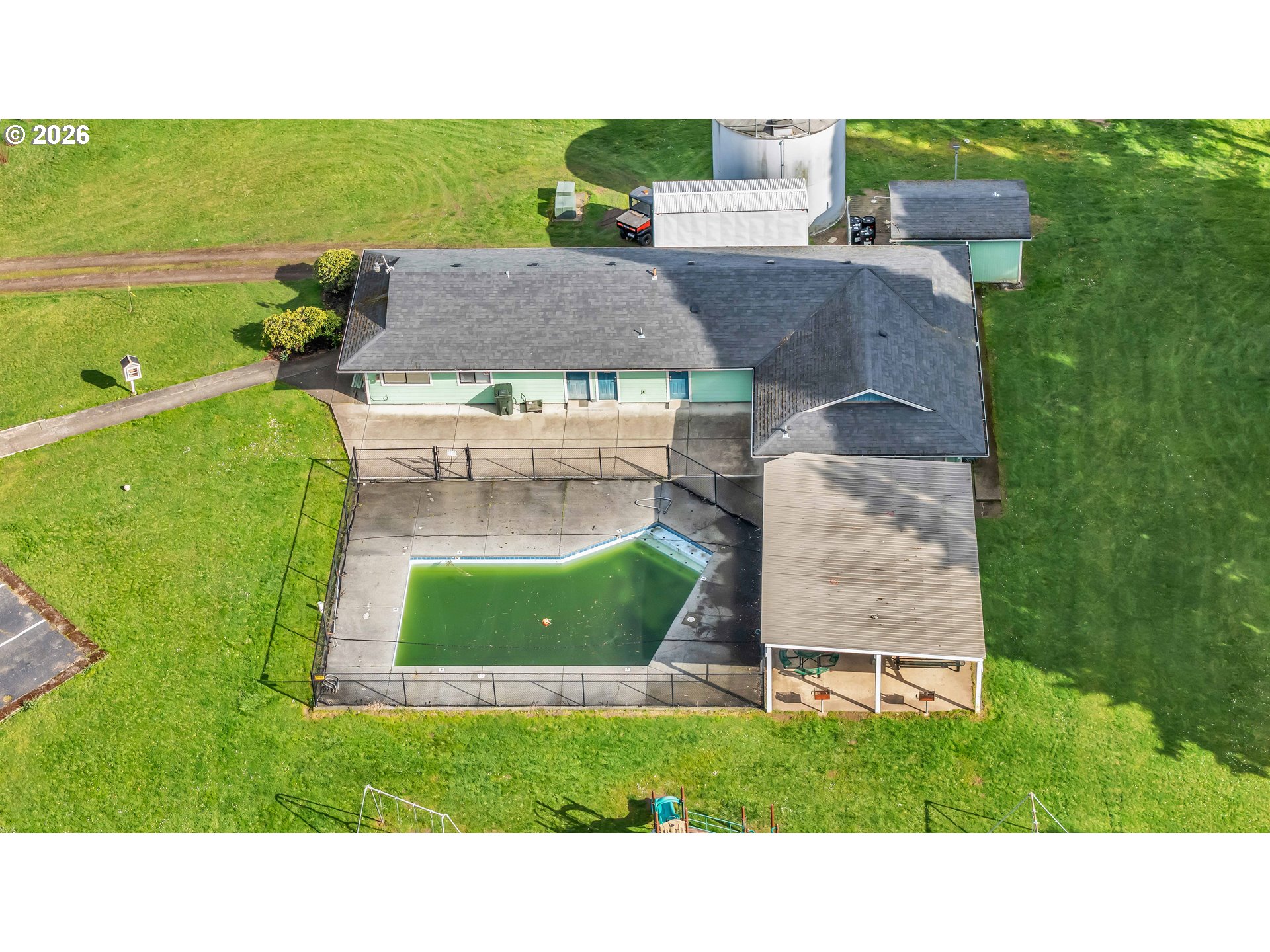 10038 South New Era Road, Unit 25 Canby, OR 97013 - Photo 36 of 39 a aerial view of a house with a garden