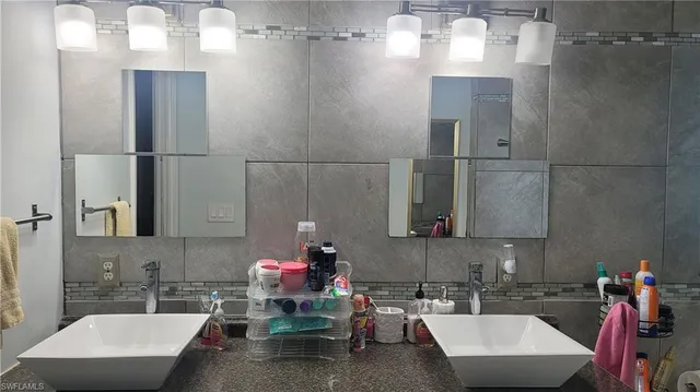 a bathroom with a sink and a bathtub