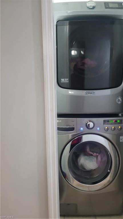 2172 45th Street Southwest Naples, FL 34116 - Photo 18 of 26 a close up view of a washer and dryer
