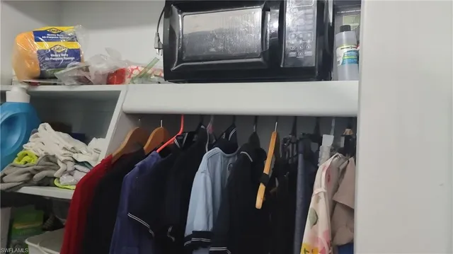 a bedroom with an bunk bed and a couch