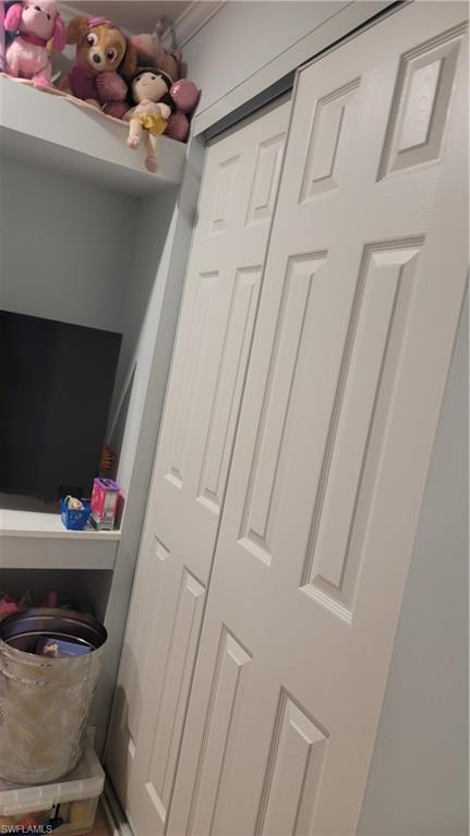 2172 45th Street Southwest Naples, FL 34116 - Photo 25 of 26 a bathroom with a sink and toilet