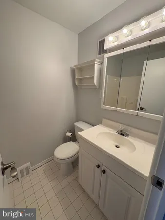 a bathroom with a sink and a toilet